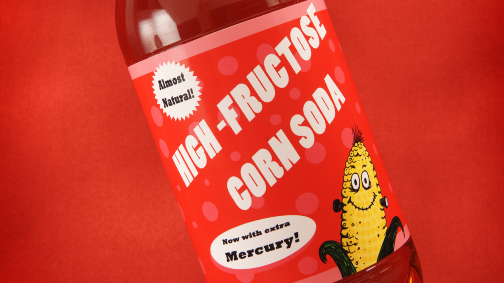 image of bottle of high fructose corn syrup with a warning label stating "now with added mercury"